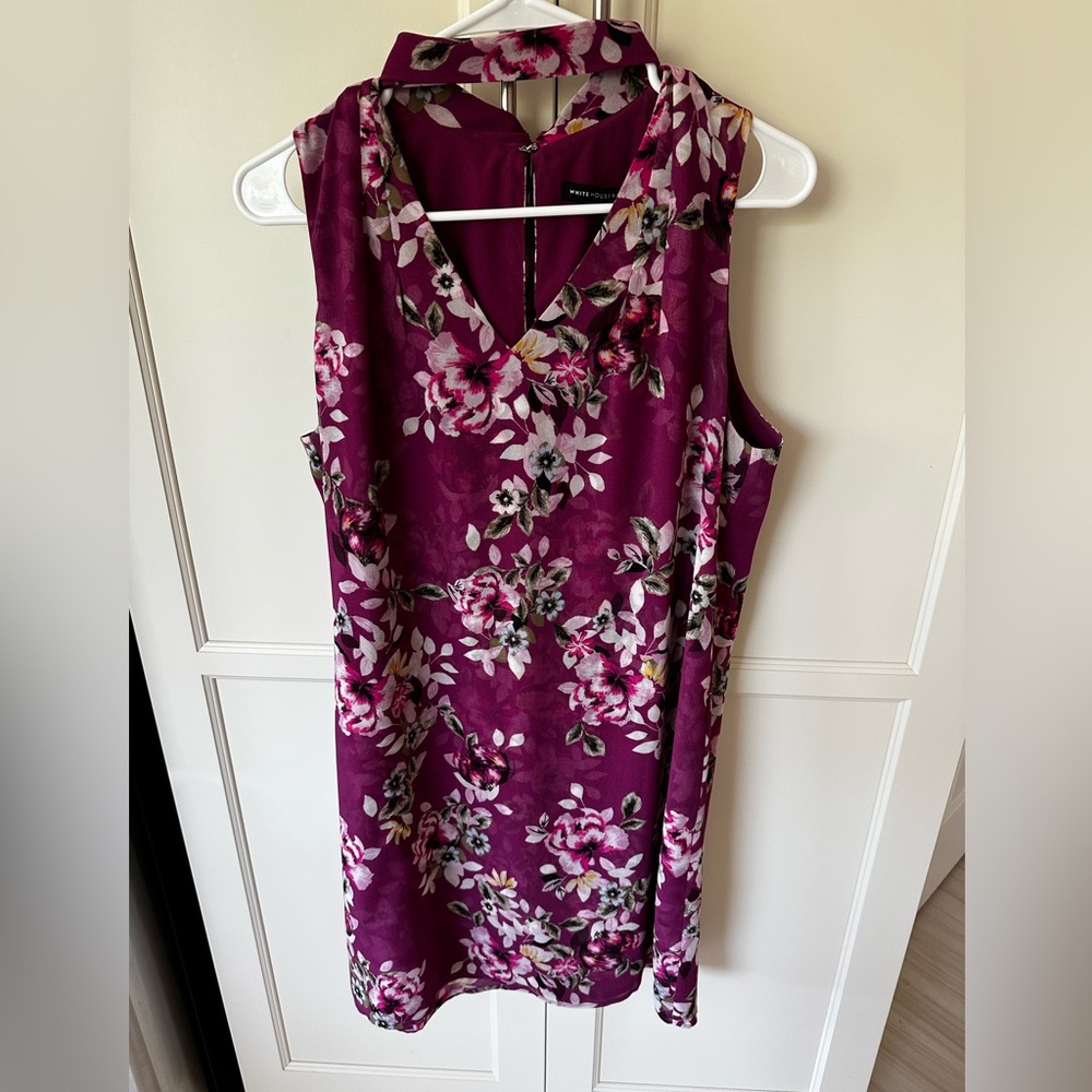 A dress by WhiteHouse/Black Market. Size 10p. Light weight crepe material.